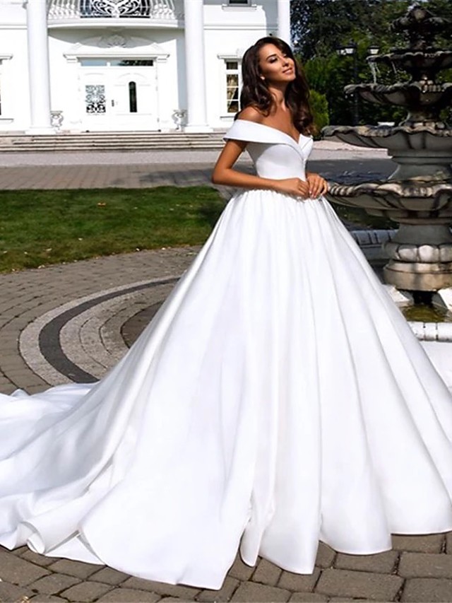 A-line Short Sleeves Tulle Wedding Gown With Cathedral Train 1