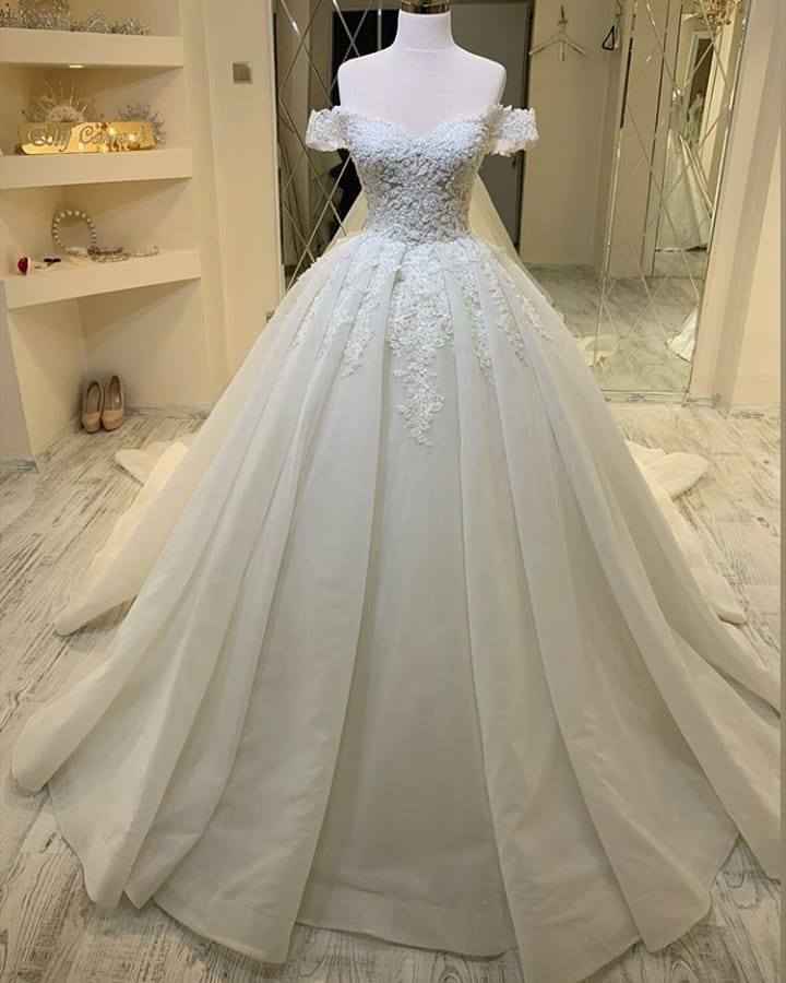A-line Off-the-shoulder Sleeveless Court Train Organza Wedding Gown With Ruffles 2