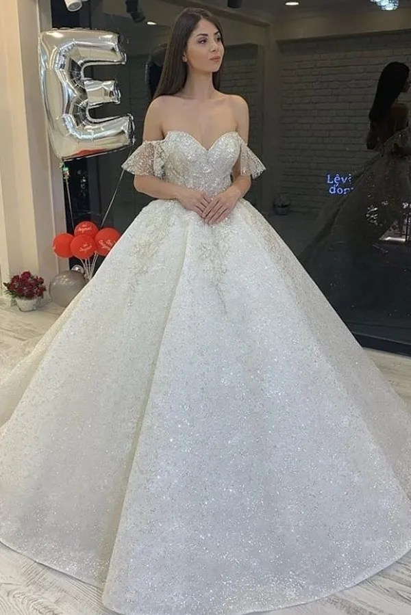 A-line Off-the-shoulder Sweetheart Neck Sleeveless Court Train Wedding Gown With Ruffles 1
