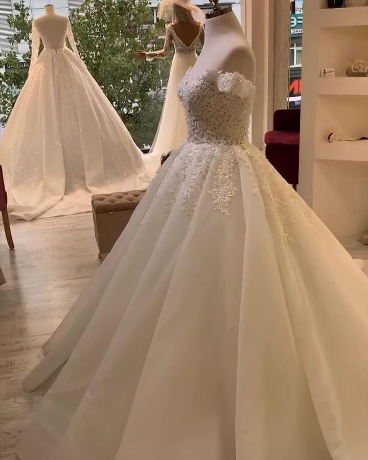 A-line Off-the-shoulder Sleeveless Court Train Organza Wedding Gown With Ruffles 3
