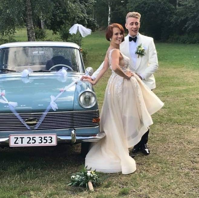 A-line Straps V-neck Sleeveless Sweep / Brush Train Tulle Bridal Gown With Ruffles 2