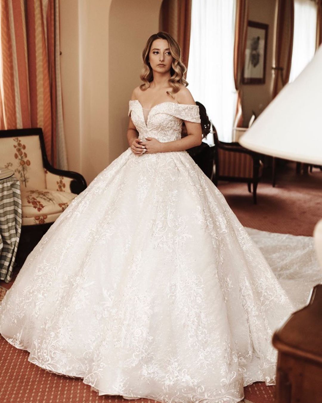 Off-the-shoulder Long Sleeves Court Train Tulle Wedding Gown With Ruffles 2