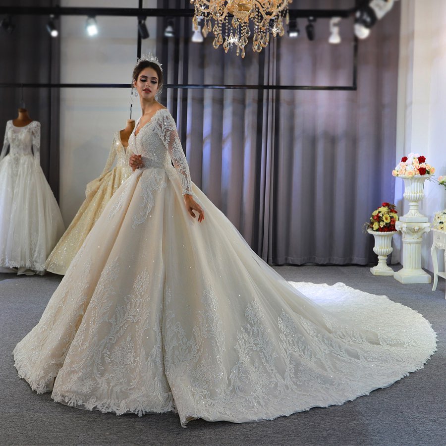 A-line Plunging Neckline Long Sleeves Court Train Lace Wedding Gown With Ruffles 7