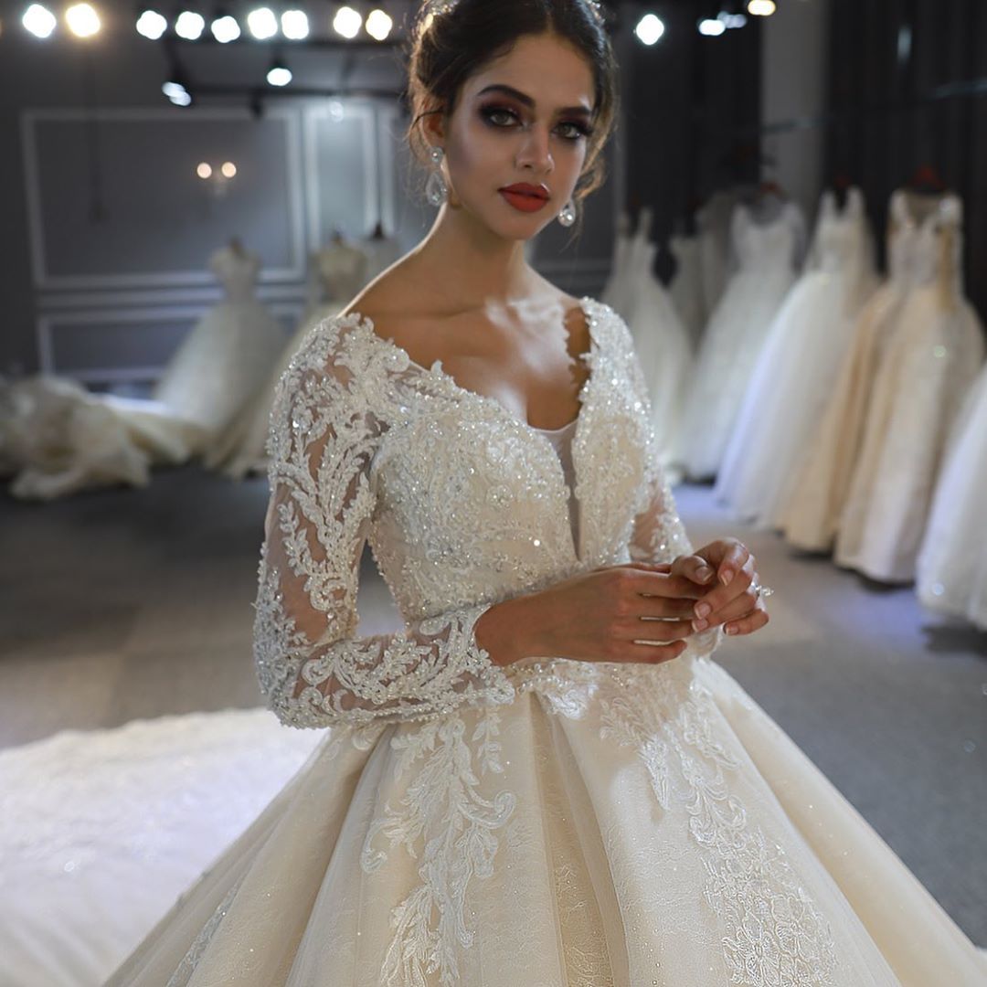 A-line Plunging Neckline Long Sleeves Court Train Lace Wedding Gown With Ruffles 6
