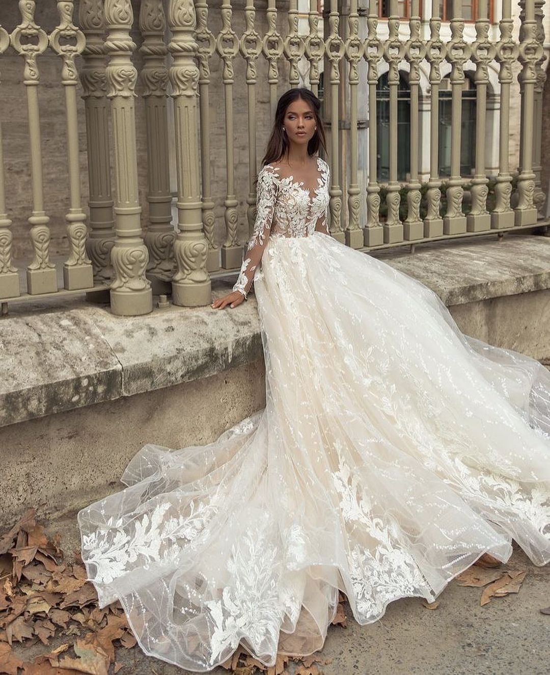 A-line Jewel Neck Long Sleeves Chapel Train Tulle Wedding Gown With Lace 2