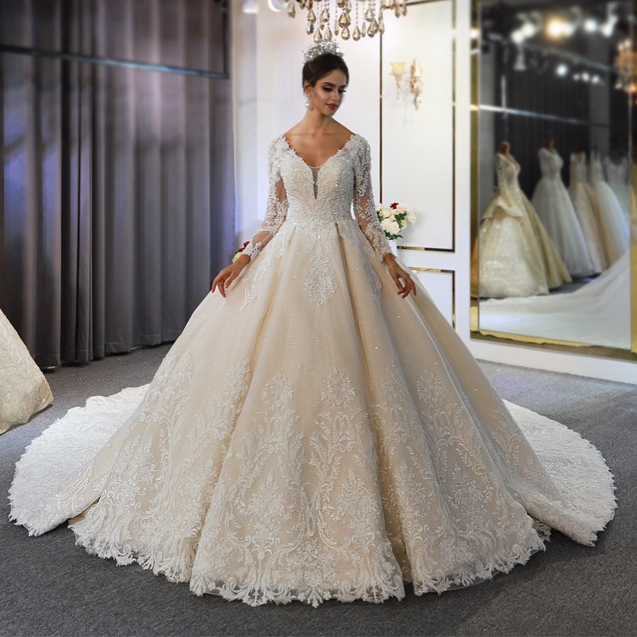 A-line Plunging Neckline Long Sleeves Court Train Lace Wedding Gown With Ruffles 2