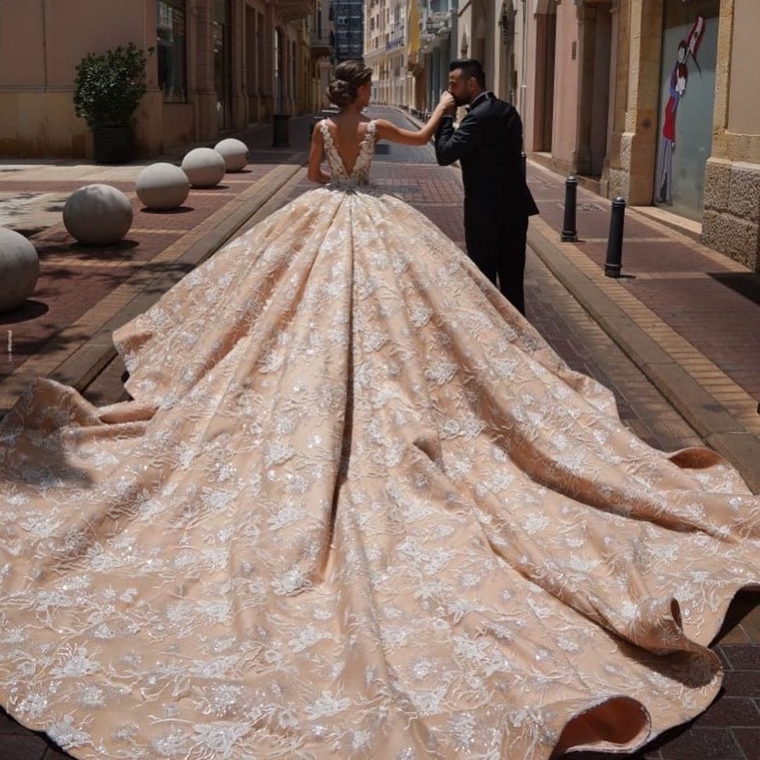 Ball Gown V-neck Sleeveless Cathedral Train Lace Wedding Gown With Lace 4