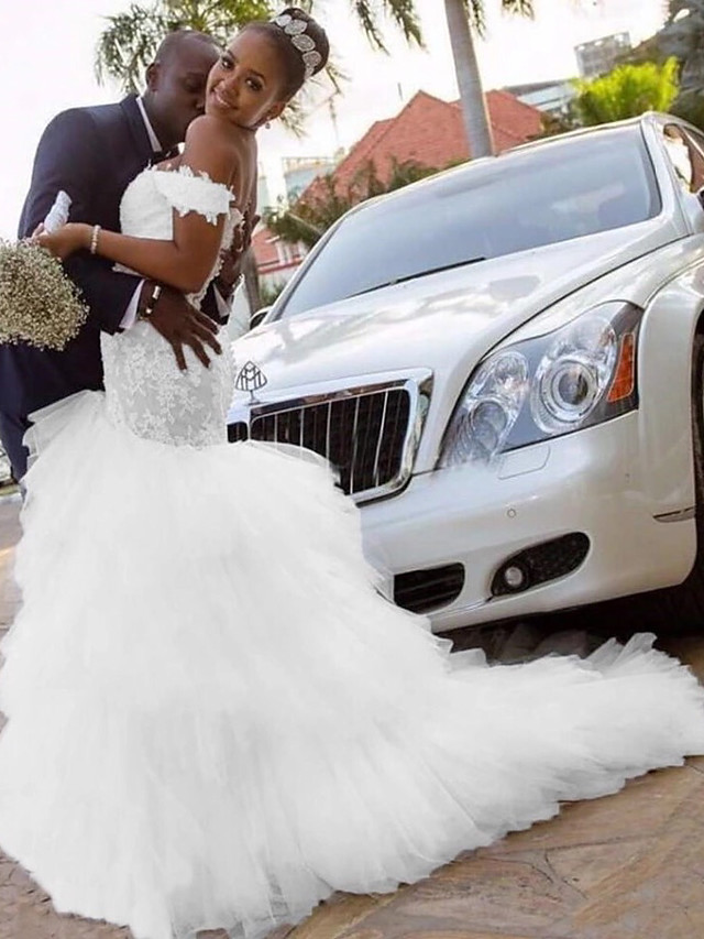 Mermaid Sleeveless Chapel Train Tulle Bridal Gown With Pearls 3