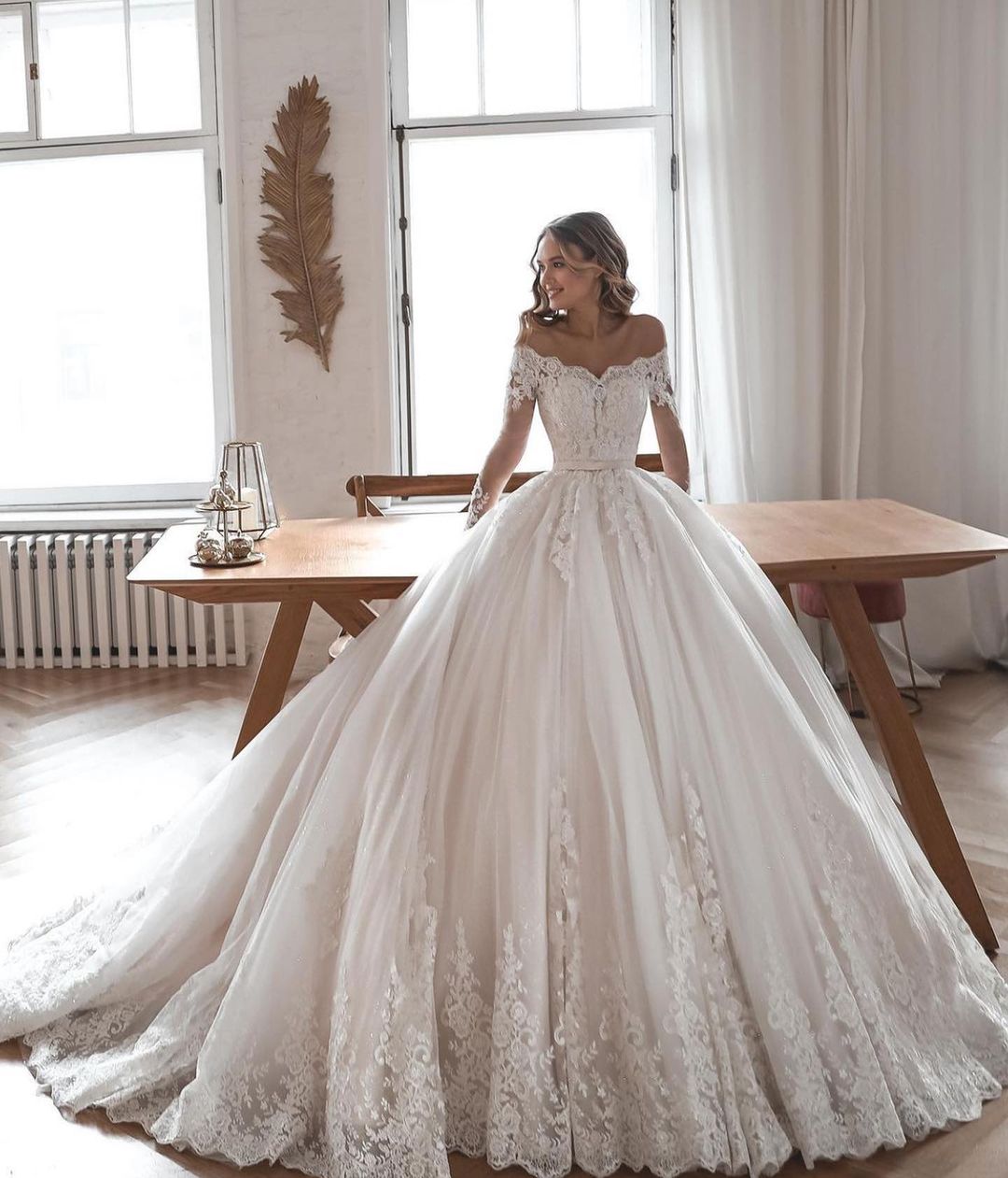 A-line Off-the-shoulder Long Sleeves Chapel Train Tulle Wedding Gown With Lace 2