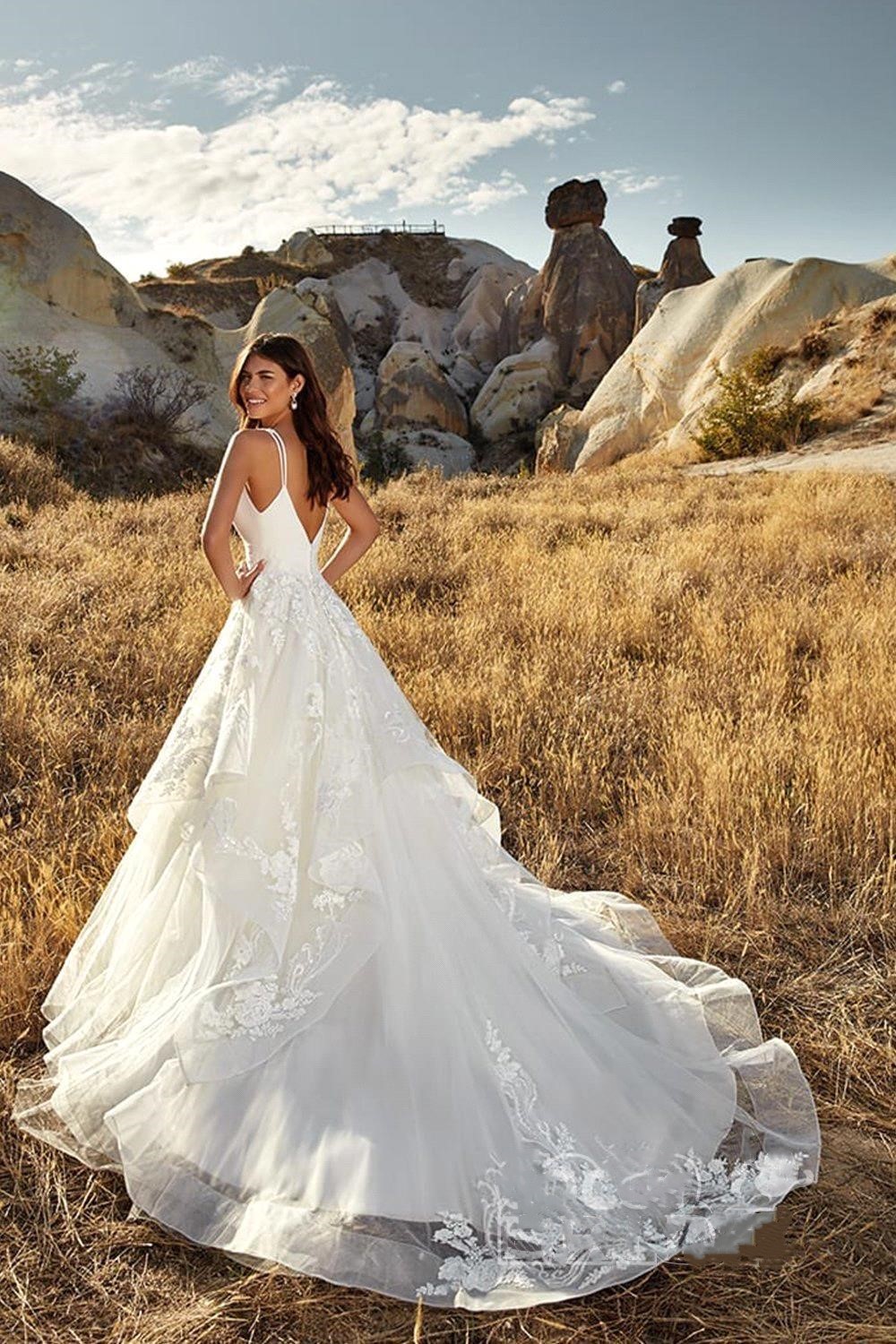 A-line Plunging Neckline Sleeveless Chapel Train Tulle Wedding Gown With Lace 2