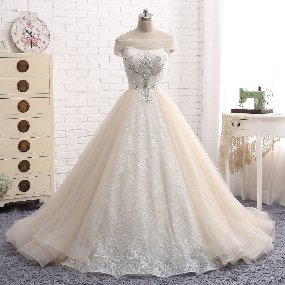 A-line Bateau Neck Floor-length Tulle Bridal Gown With Lace 6