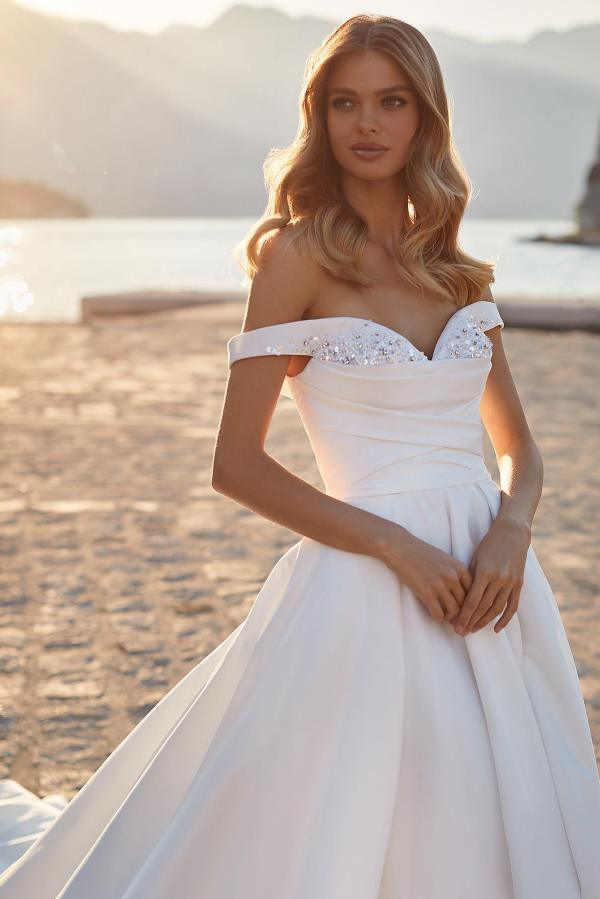 A-line Off-the-shoulder Sleeveless Chapel Train Satin Bridal Gown With Pearls 3