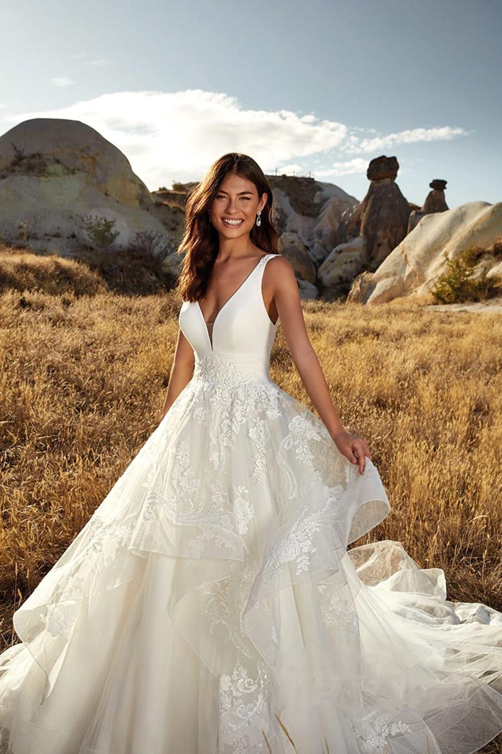 A-line Plunging Neckline Sleeveless Chapel Train Tulle Wedding Gown With Lace 3