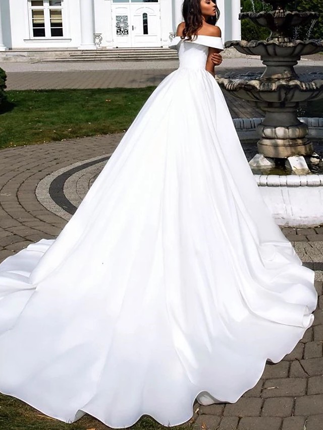 A-line Short Sleeves Tulle Wedding Gown With Cathedral Train 2