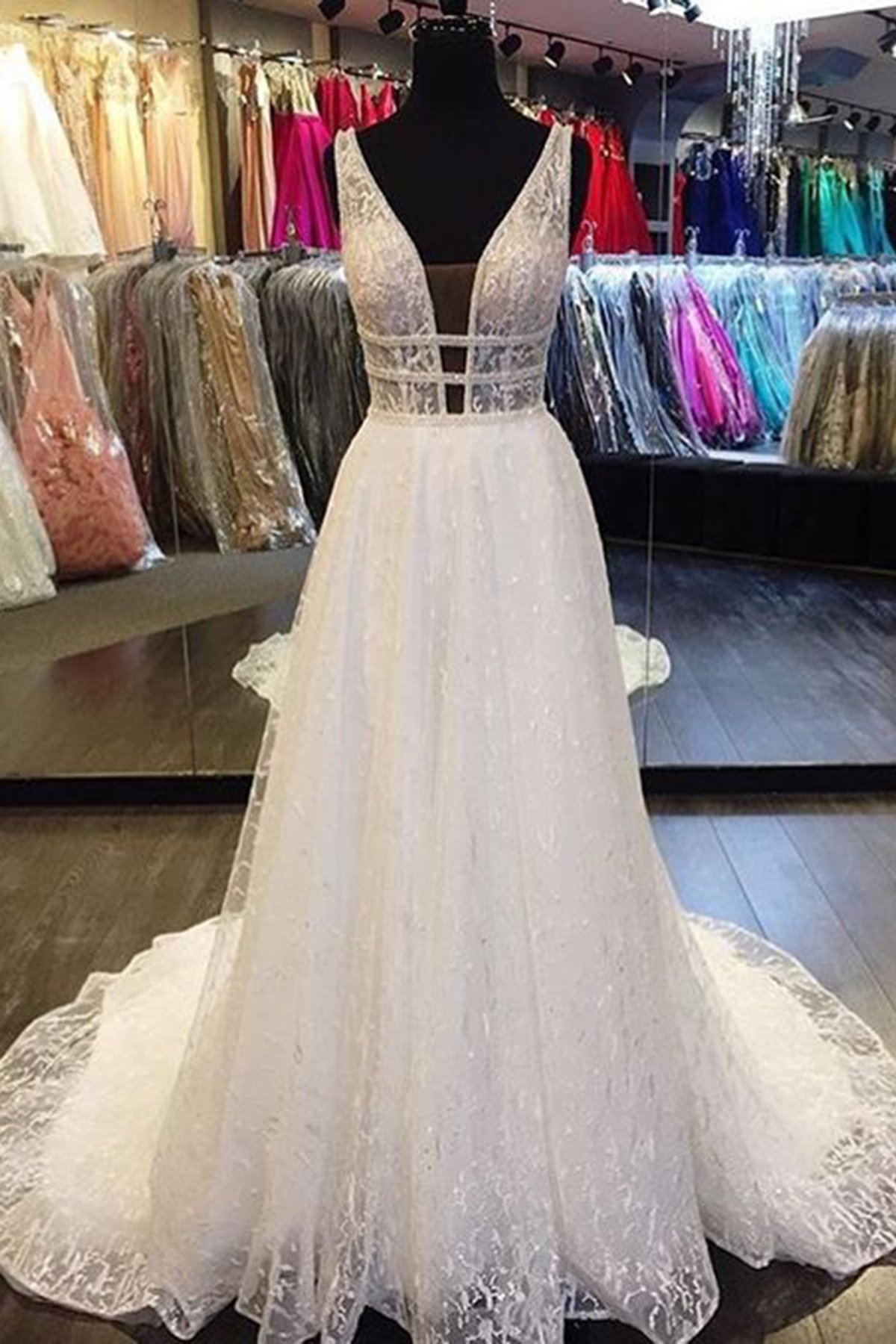 A-line V-neck Sleeveless Floor-length Tulle Wedding Gown With Lace 1