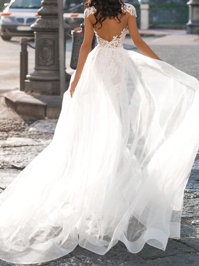 A-line V-neck Short Sleeves Sweep / Brush Train Tulle Wedding Gown With Buttons 2