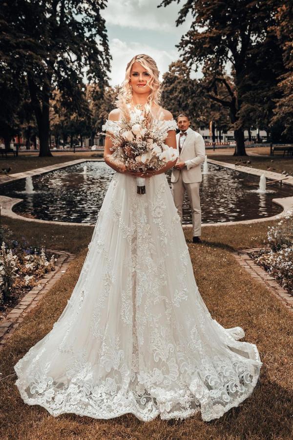 A-line Off-the-shoulder Sleeveless Chapel Train Lace Wedding Gown With Pearls 1