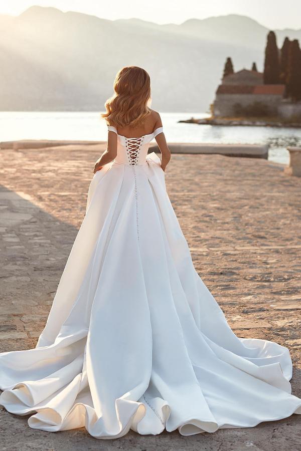 A-line Off-the-shoulder Sleeveless Chapel Train Satin Bridal Gown With Pearls 2