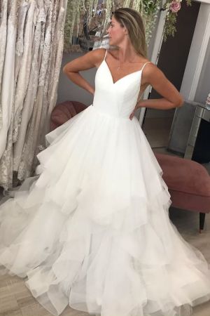 A-line Spaghetti Straps Sleeveless Sweep / Brush Train Tulle Wedding Gown With Ruffles