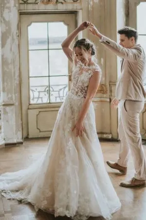 A-line Jewel Neck Sleeveless Chapel Train Lace Bridal Gown With Lace