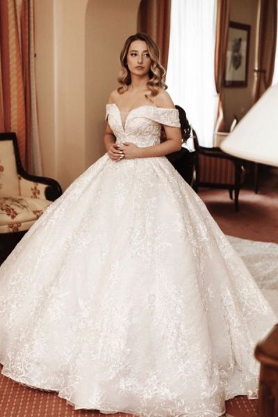 Off-the-shoulder Long Sleeves Court Train Tulle Wedding Gown With Ruffles