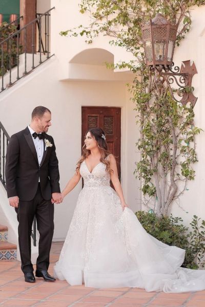 A-line V-neck Sleeveless Chapel Train Tulle Bridal Dress With Ruffles