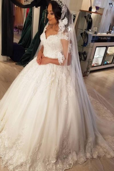 Ball Gown Jewel Neck Sleeveless Chapel Train Lace Bridal Dress With Lace
