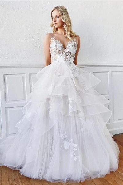 A-line Spaghetti Straps Sleeveless Chapel Train Tulle Wedding Gown With Lace