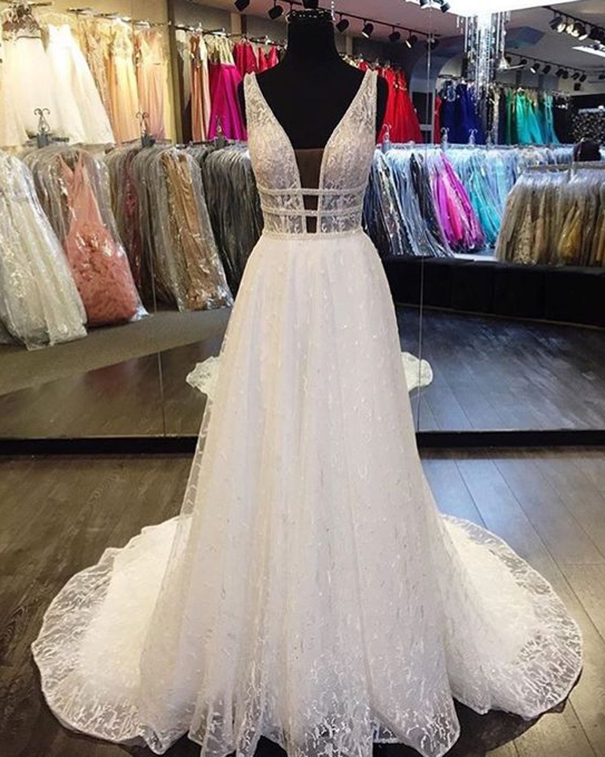 A-line V-neck Sleeveless Floor-length Tulle Wedding Gown With Lace 2