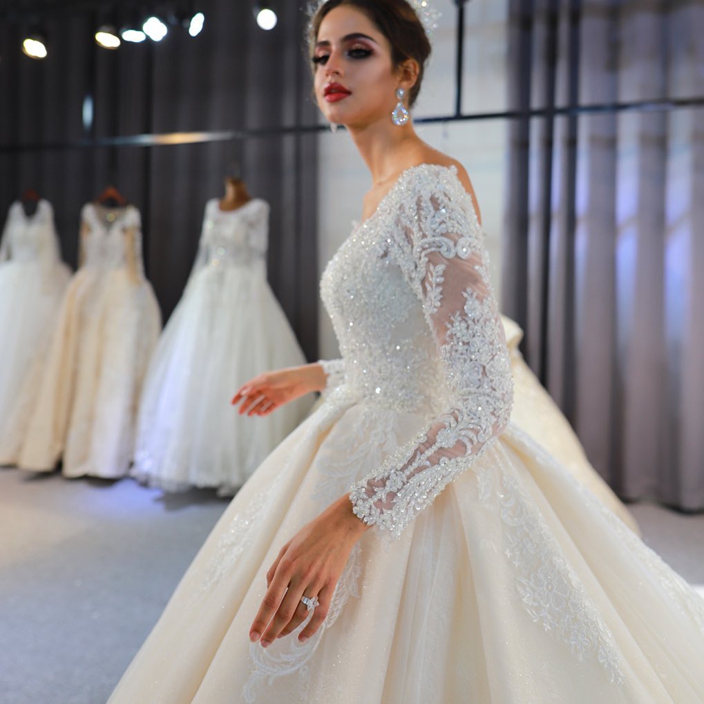 A-line Plunging Neckline Long Sleeves Court Train Lace Wedding Gown With Ruffles 3