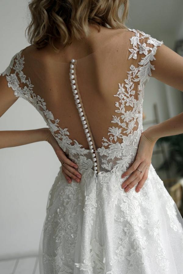 A-line Jewel Neck Sleeveless Chapel Train Lace Bridal Gown With Appliques 4