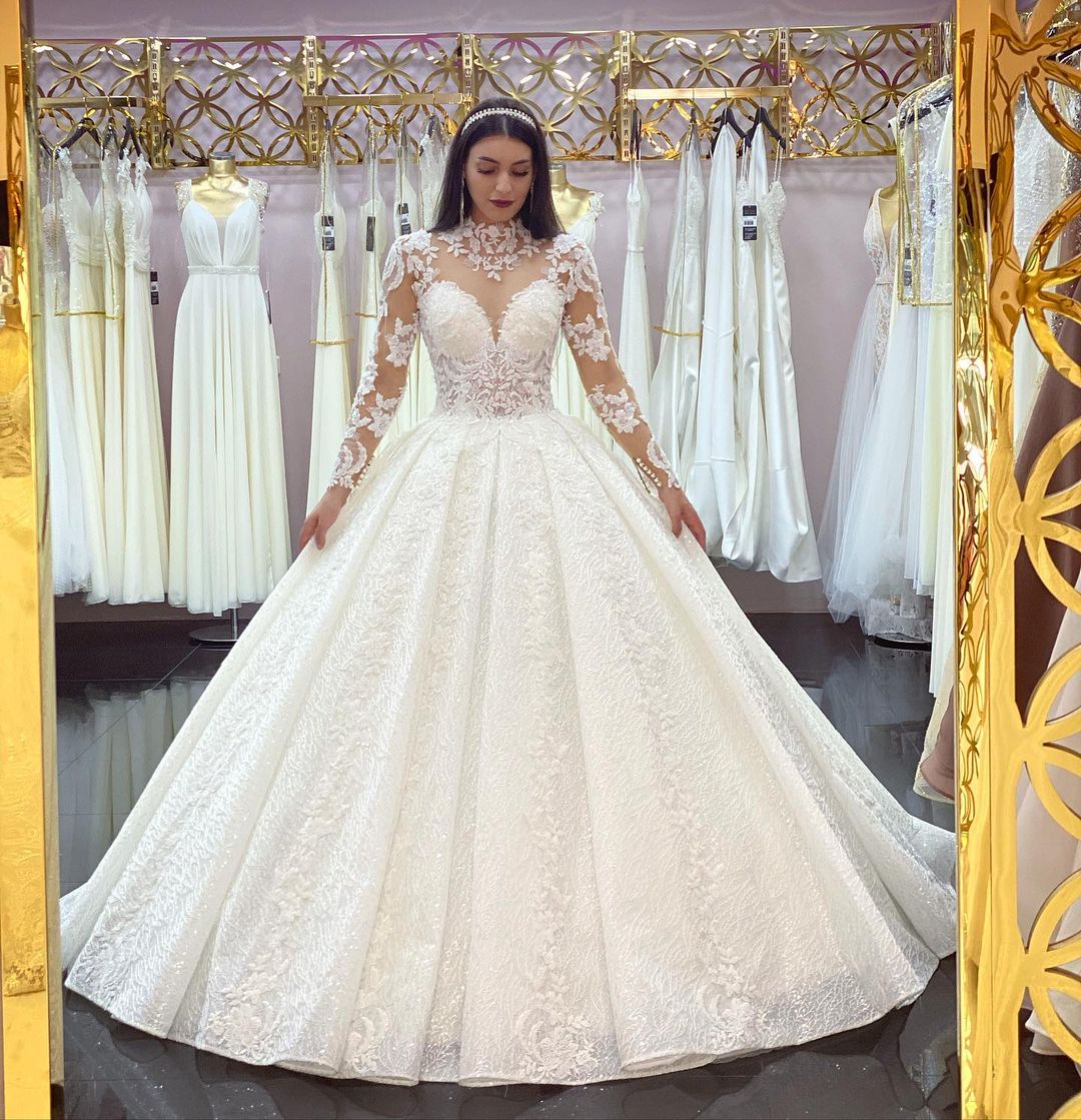A-line Jewel Neck Long Sleeves Chapel Train Lace Bridal Dress With Lace 2