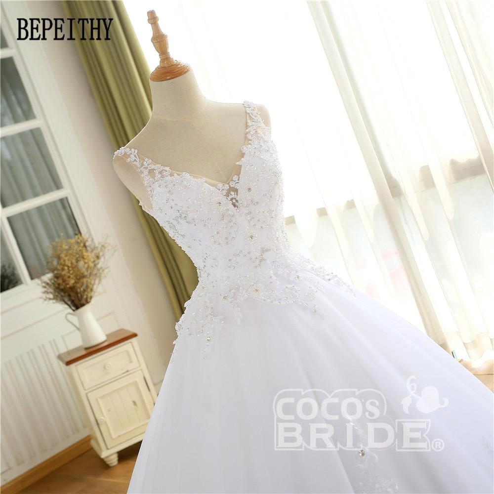A-line V-neck Sleeveless Sweep / Brush Train Lace Bridal Gown With Appliques 6